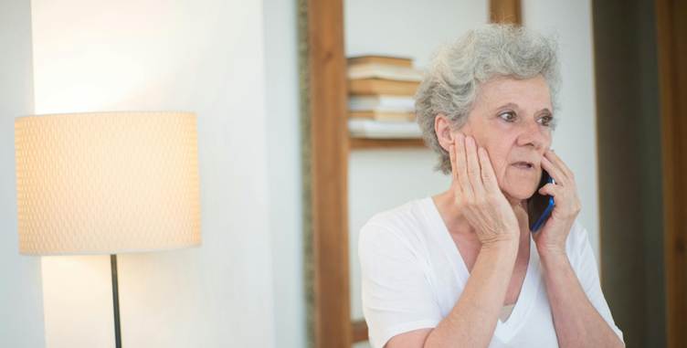 A person touching her face

AI-generated content may be incorrect.