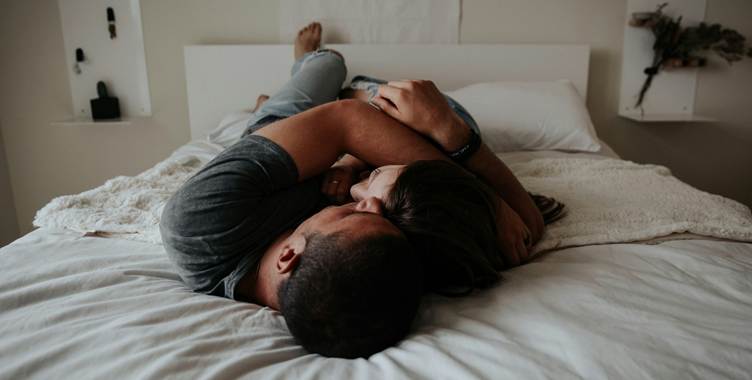 A person and person lying on a bed

AI-generated content may be incorrect.