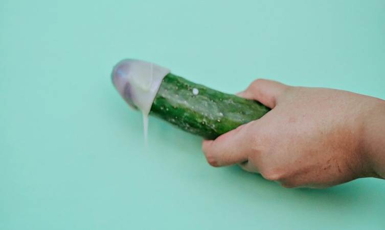 A hand holding a cucumber

AI-generated content may be incorrect.